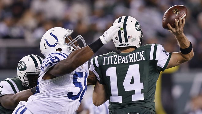 Indianapolis Colts outside linebacker Trent Cole (58) pressures New York Jets quarterback Ryan Fitzpatrick (14) forcing an incomplete pass during the 1st half at MetLife Stadium in East Rutherford, N.J., on Monday, Dec. 5, 2016.