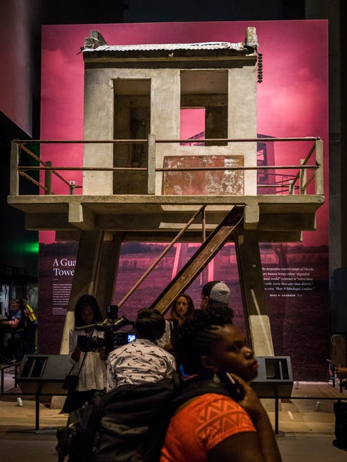 A 20-foot prison guard tower from the Louisiana State Penitentiary in Angola, erected between the 1930s and 1940s, which was built on former plantation land is seen during the media preview for the Smithsonian's National Museum of African American History and Culture in Washington, on Sept. 14, 2016.