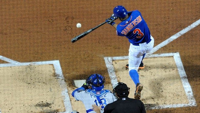 QUEENS: World Series Game 5- New York Mets  Curtis Granderson hits a solo home run in the first inning of the Game 5 of the World Series at Citi Field on Sunday, Nov. 1, 2015.