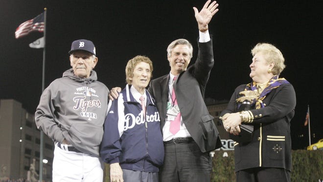 Jim Leyland, Mike Ilitch, Dave Dombrowski and the AL honorary president Jackie Autry on the stage after  the Tigers won Game 4 of the ALCSs between the Tigers and the Yankees in 2012.