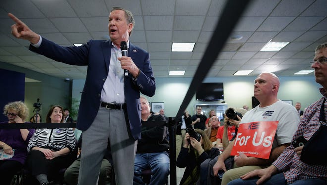 Kasich addresses a town hall-style meeting in the Hazel Hall Atrium at the George Mason University Law School on March 1, 2016, in Fairfax, Va.