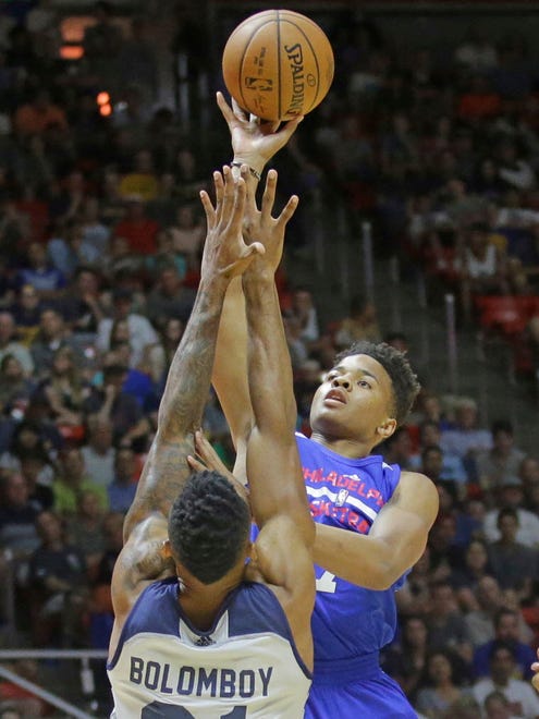 Philadelphia 76ers guard Markelle Fultz shoots as Utah Jazz forward Joel Bolomboy defends during the first half of an NBA Summer League game in Salt Lake City.