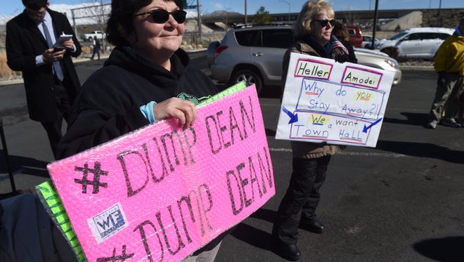 Protestors assemble outside as Senator Dean Heller and Representative Mark Amodei participate in the Carson City Chamber of Commerce monthly Soup's On! event at the Gold Dust West hotel and casino in Carson City on Feb. 22, 2017.