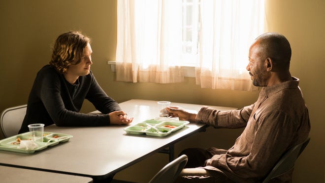 Lennie James as Morgan Jones, Logan Miller as Benjamin - The Walking Dead _ Season 7, Episode 2 - Photo Credit: Gene Page/AMC