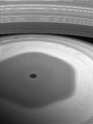 A strange hexagon-shaped storm spins over the northern hemisphere of Saturn.