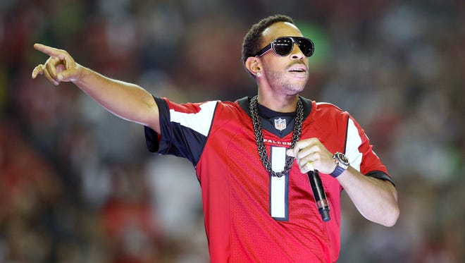 Recording artist Ludacris performs during half time of the NFC Divisional playoff between the Atlanta Falcons and the Seattle Seahawks at Georgia Dome.
