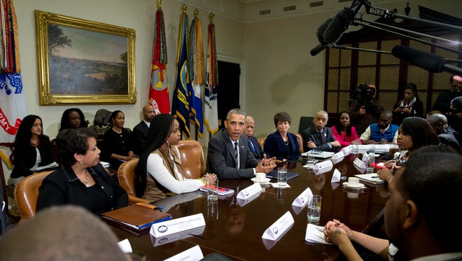 President Obama met with civil rights leaders in the Roosevelt Room of the White House in Washington on Feb. 18, 2016. From left are, Attorney General Loretta Lynch, Brittany Packnett, of the President's Task Force on 21st Century Policing and co-founder of Campaign Zero; Obama; Rep. John Lewis, D-Ga.; Senior White House Adviser Valerie Jarrett; Al Sharpton, founder and president of the National Action Network; Sherrilyn Ifill, president of the NAACP Legal Defense Fund; and DeRay McKesson, co-founder of Campaign Zero.