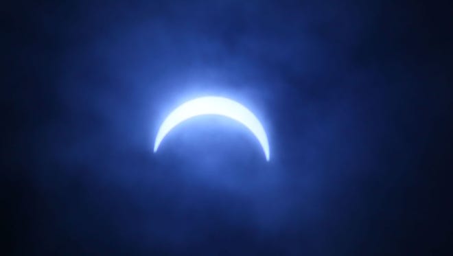 At 1:18 p.m., the eclipse was at 83% percent in Milwaukee from outside the Milwaukee Public Museum on Monday.