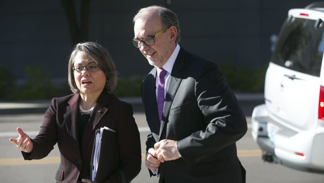 Carlos Manuel Sada Solana, the Mexican ambassador to the U.S., alongside Claudia Franco Hijuelo,  the consul general of Mexico in Phoenix, get out of their SUV to visit with reporters, editors and members of the editorial board of The Arizona Republic and azcentral.com in Phoenix on Nov. 30, 2016.