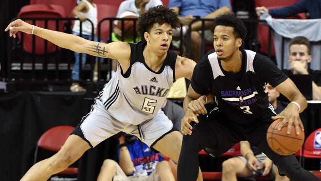 D.J. Wilson #5 of the Milwaukee Bucks guards Skal Labissiere #3 of the Sacramento Kings during the 2017 Summer League at the Thomas & Mack Center on July 12, 2017 in Las Vegas, Nevada.