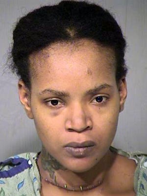 Octavia Rogers, 29, of Phoenix, is being held on suspicion of first-degree murder in the stabbing deaths of her three sons but has not been charged with a crime.