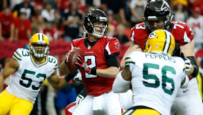 Atlanta Falcons quarterback Matt Ryan (2) looks to pass in the first quarter against the Green Bay Packers at the Georgia Dome.