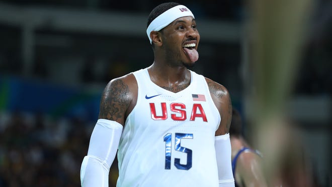 United States forward Carmelo Anthony (15) reacts during the men's preliminary round against France in the Rio 2016 Summer Olympic Games at Carioca Arena 1.