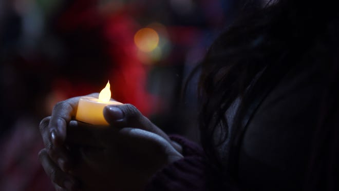 A candlelight vigil in Los Angeles on Jan. 26, 2017.