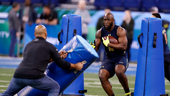 LSU Tigers running back Leonard Fournette goes through workout drills during the 2017 NFL Combine at Lucas Oil Stadium.