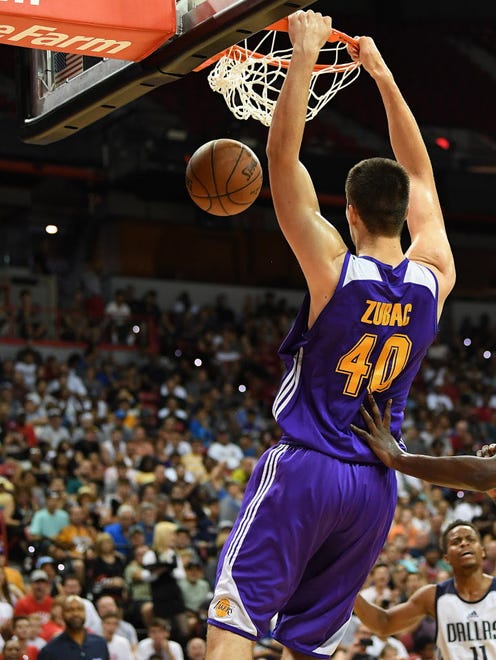 Los Angeles Lakers center Ivica Zubac (40) dunks the ball during an NBA Summer League playoff game against the Dallas Mavericks.