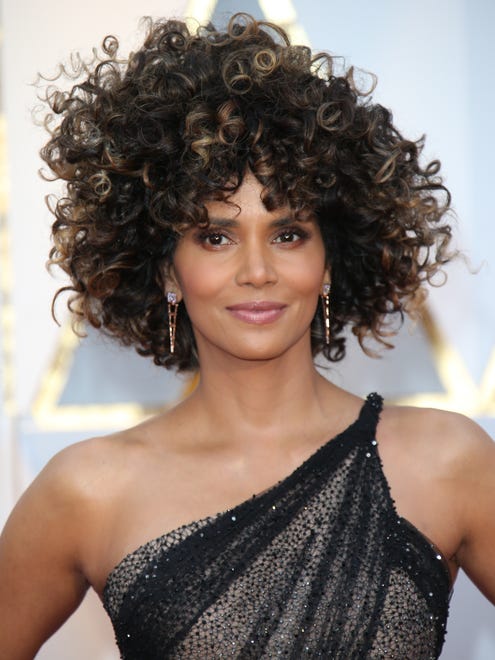 Halle Berry's big, brown curls killed the competition. She said she was celebrating her hair "by allowing it to be natural and free."