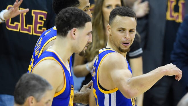 Golden State Warriors guard Stephen Curry (30) reacts after being ejected out of the game against the Cleveland Cavaliers during the fourth quarter in Game 6 of the NBA Finals at Quicken Loans Arena.
