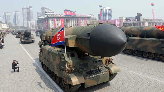 This April 15, 2017 picture released from North Korea's official Korean Central News Agency  on April 16, 2017 shows Korean People's ballistic missiles being displayed through Kim Il-Sung square in Pyongyang.
