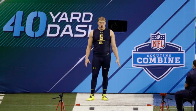 Utah offensive lineman Garett Bolles runs the 40-yard dash at the NFL football scouting combine Friday, March 3, 2017, in Indianapolis.