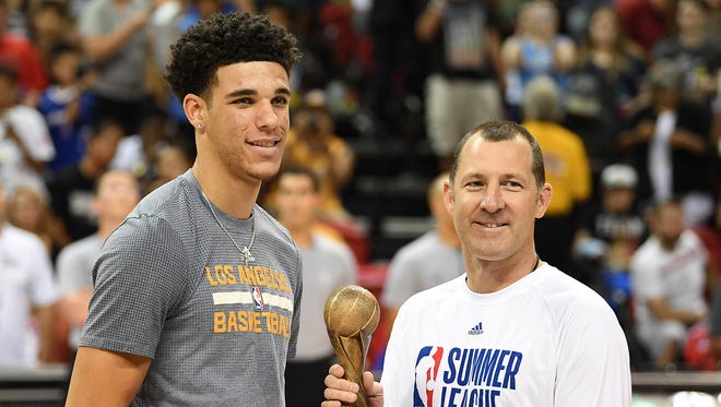 Los Angeles Lakers guard Lonzo Ball receives his NBA Summer League MVP trophy before the title game.