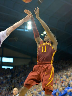 Iowa State Cyclones guard Monte Morris (11) shoots a jump shot during the second half agaisnt the Kansas Jayhawks at Allen Fieldhouse. Iowa State won 92-89.