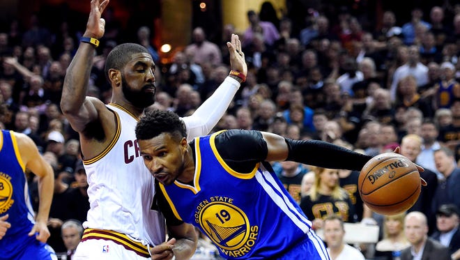 Golden State Warriors guard Leandro Barbosa (19) drives to the basket against Cleveland Cavaliers guard Kyrie Irving (2) during the second quarter in Game 6 of the NBA Finals at Quicken Loans Arena.