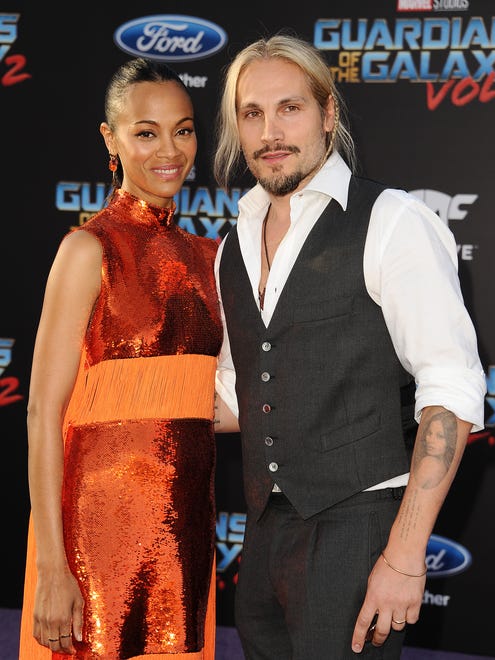 HOLLYWOOD, CA - APRIL 19:  Actress Zoe Saldana and husband Marco Perego attend the premiere of "Guardians of the Galaxy Vol. 2" at Dolby Theatre on April 19, 2017 in Hollywood, California.  (Photo by Jason LaVeris/FilmMagic) ORG XMIT: 700033563 ORIG FILE ID: 670475576