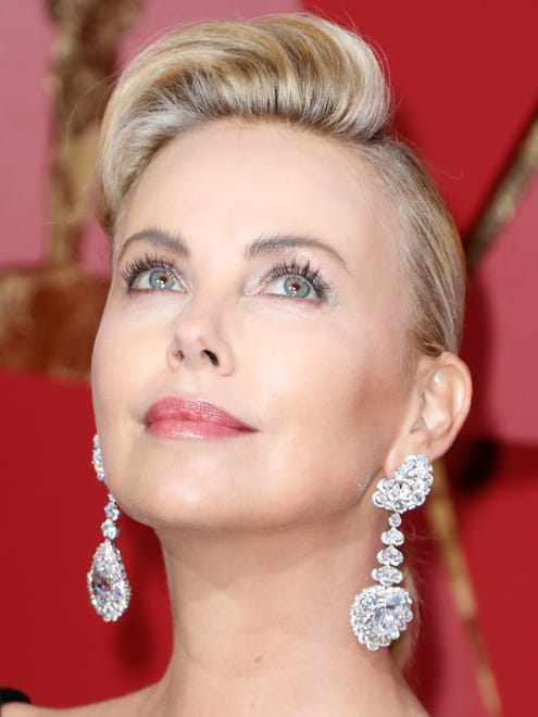Charlize Theron was dripping in Chopard jewels.The drop earrings feature 59.9 carats worth of diamonds.