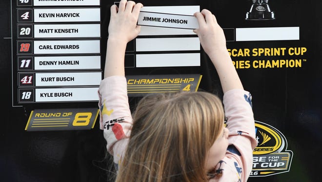 Round 3: Jimmie Johnson's daughter Genevieve puts her father's name on the final four column of the Chase for the Sprint Cup leaderboard after Johnson won for the ninth time at Martinsville Speedway to clinch a berth in the title race.
