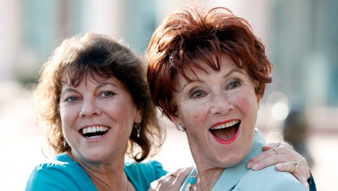 FILE - In this June 18, 2009 file photo, actresses Erin Moran, left, and Marion Ross pose together at the Academy of Television Arts and Sciences' "A Father's Day Salute to TV Dads" in the North Hollywood section of Los Angeles. Moran, the former child star who played Joanie Cunningham in the sitcoms "Happy Days" and "Joanie Loves Chachi," has died at age 56. Police in Harrison County, Indiana said that she had been found unresponsive Saturday, April 22, 2017, after authorities received a 911 call. (AP Photo/Matt Sayles, File) ORG XMIT: CAET958