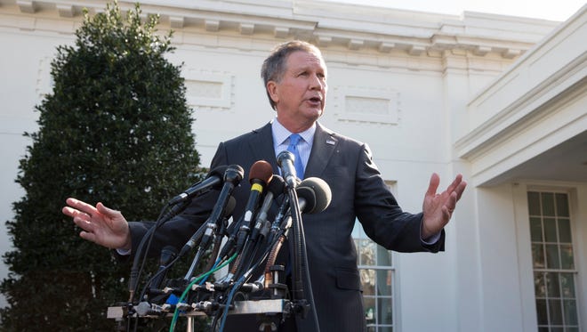 Kasich responds to questions from members of the media outside the West Wing of the White House following his meeting with President Trump on Feb. 24, 2017.