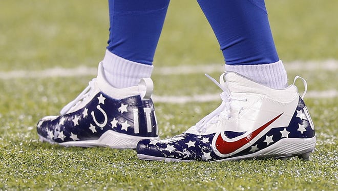 Shoes of Indianapolis Colts longsnapper Matt Overton (45) before facing off against the New York Jets at MetLife Stadium in East Rutherford, N.J., on Monday, Dec. 5, 2016.