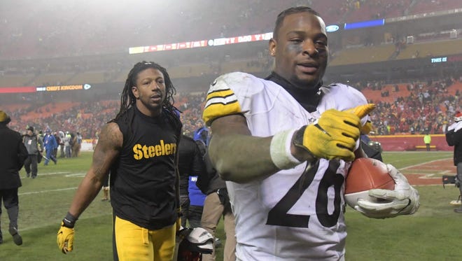 Steelers running back Le'Veon Bell (26) walks off the field after Pittsburgh defeated the Kansas City Chiefs.