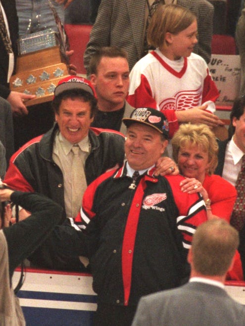 STANLEY CUP--RED WINGS OWNER MIKE ILITCH hugs coach SCOTTY BOWMAN after their  Stanley Cup  win over the Flyers Saturday night at Joe Louis Arena in 1997.
