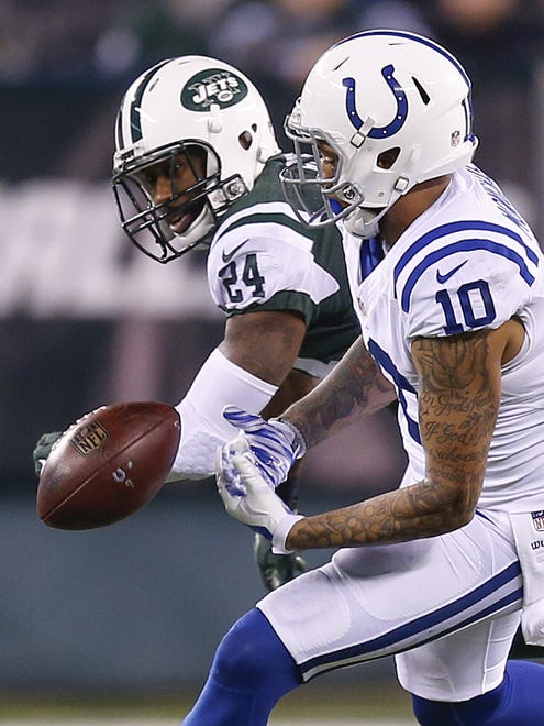 New York Jets cornerback Darrelle Revis (24) breaks up a pass intended for Indianapolis Colts wide receiver Donte Moncrief (10) during the second half at MetLife Stadium in East Rutherford, N.J., on Monday, Dec. 5, 2016.