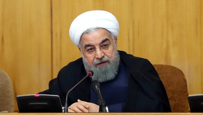 A handout photo made available by the presidential official website shows Iranian President Hassan Rouhani speaking during the cabinet meeting in Tehran on July 19, 2017.