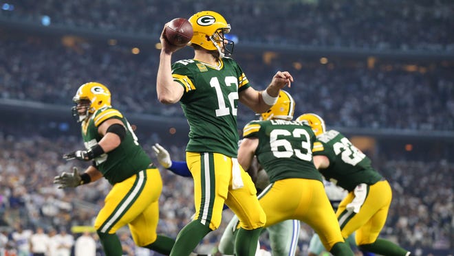 Packers QB Aaron Rodgers (12) carved up the Cowboys on Sunday.