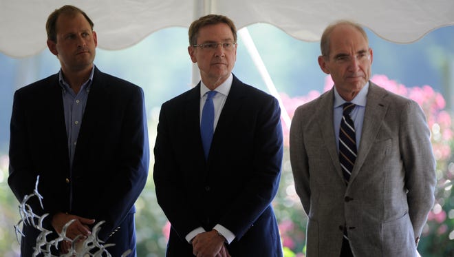 Congressman Andy Barr, Mayor Jim Gray, and University of Kentucky President Dr. Eli Capilouto (left to Right) during the memorial service for the 10th anniversary of Comair flight 5191 crash in Lexington on Saturday.