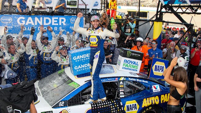 Chase Elliott celebrates in Dover victory lane after winning the Gander Outdoors 400 on Oct. 7, 2018.