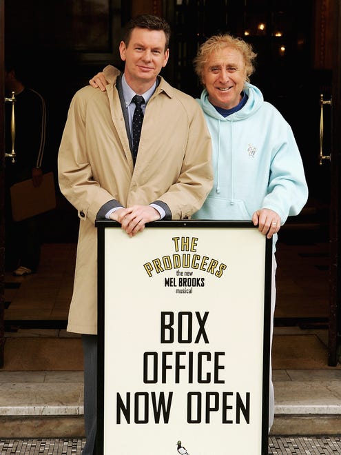 Gene Wilder (right) and John Gordon Sinclair pose on the steps of the Theatre Royal, the London theatrical home of 'The Producers,' on June 6, 2005. The stars played the role of Leo Bloom, with Wilder starring in the 1968 film version and Sinclair on the West End stage.