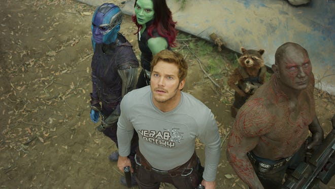 Nebula (Karen Gillan, from far left), Gamora (Zoe Saldana), Peter Quill (Chris Pratt), Groot (voiced by Vin Diesel), Rocket (voiced by Bradley Cooper) and Drax (Dave Bautista) face new problems in the sequel 'Guardians of the Galaxy Vol. 2.'