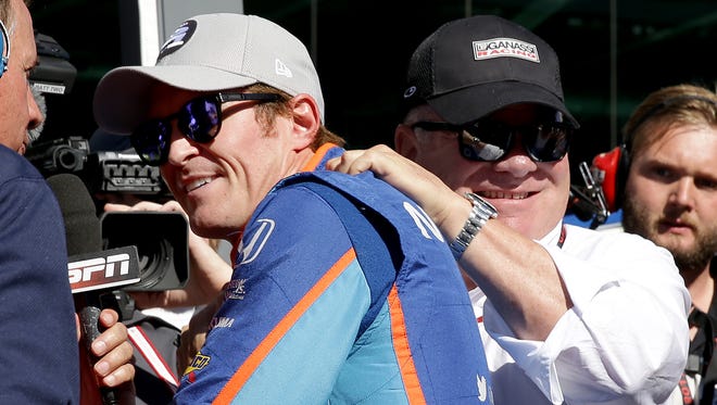 Chip Ganassi Racing IndyCar driver Scott Dixon (9) is congratulated by team owner Chip Ganassi after winning the pole position for the Indianapolis 500 during Armed Forces Pole Day Sunday, May 21, 2017, afternoon at the Indianapolis Motor Speedway.