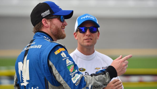 Jamie McMurray (right) says of Dale Earnhardt Jr.'s absence: 'When Dale Jr. is the most popular driver in our sport and you don’t show up at a track for two or three weeks, it’s not that you’re forgotten but it’s crazy how things move on.'
