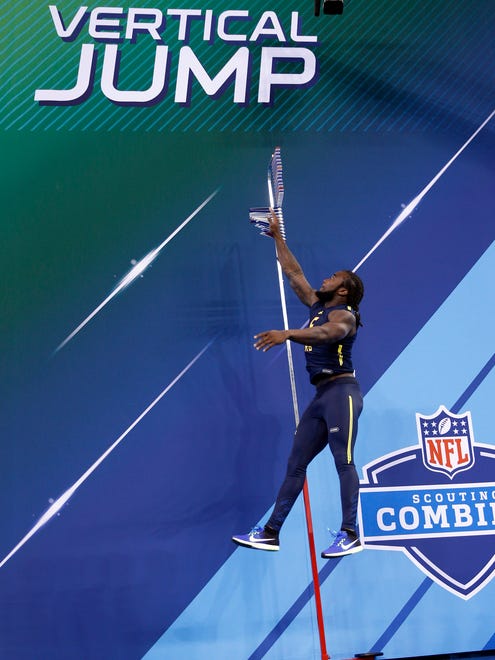 Florida State Seminole running back Dalvin Cook does the vertical jump during the 2017 NFL Combine at Lucas Oil Stadium.