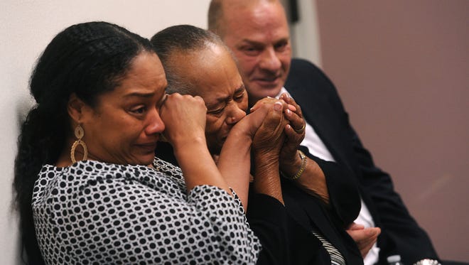 O.J. Simpson's sister Shirley Baker, middle, daughter Arielle Simpson, left, and friend Tom Scotto react during Simpson's parole hearing at Lovelock Correctional Center.