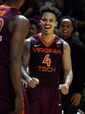 Virginia Tech Hokies guard Seth Allen (4) reacts following a made basket against the Virginia Cavaliers at Cassell Coliseum.