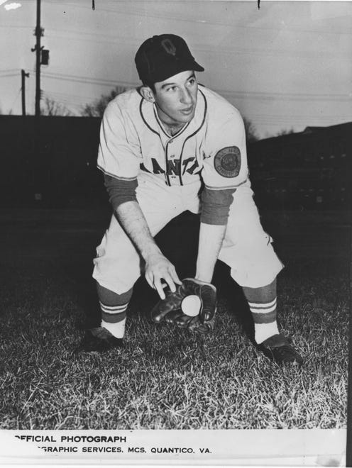 Mike Ilitch in an old uniform as a player for the Marines' team from Quantico, VA.  Ilitch also played for the Tigers' farm system in the 1950s.