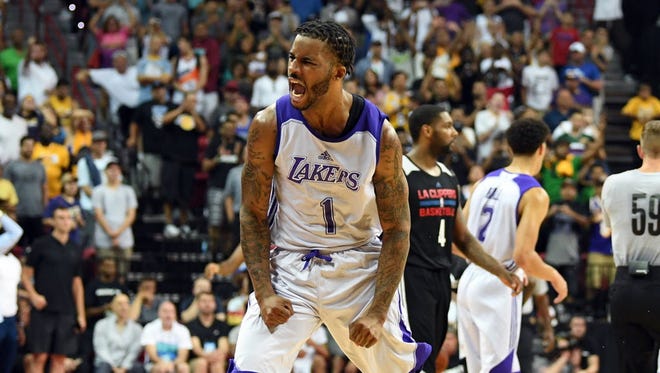 Los Angeles Lakers guard Vander Blue (1) celebrates during an NBA Summer League game against the Los Angeles Clippers at Las Vegas' Thomas & Mack Center.