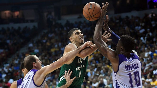 Boston Celtics forward Jayson Tatum (11) is fouled against the Los Angeles Lakers during the second half at Thomas & Mack Center.